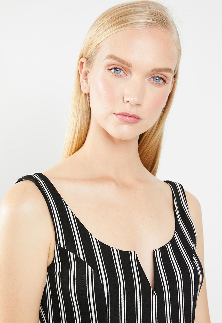 Revenge - V-front cut-out striped print jumpsuit - black & white 