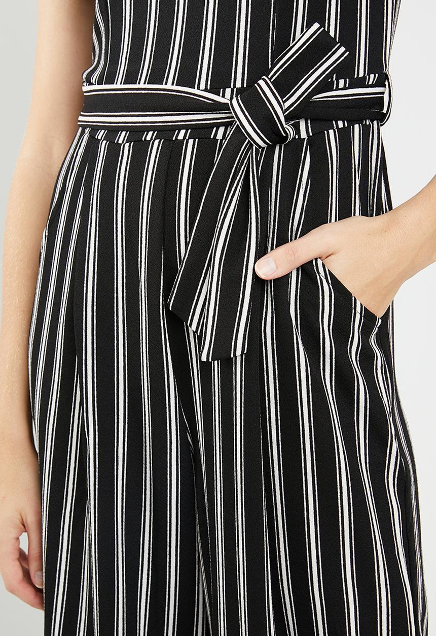 Revenge - V-front cut-out striped print jumpsuit - black & white 