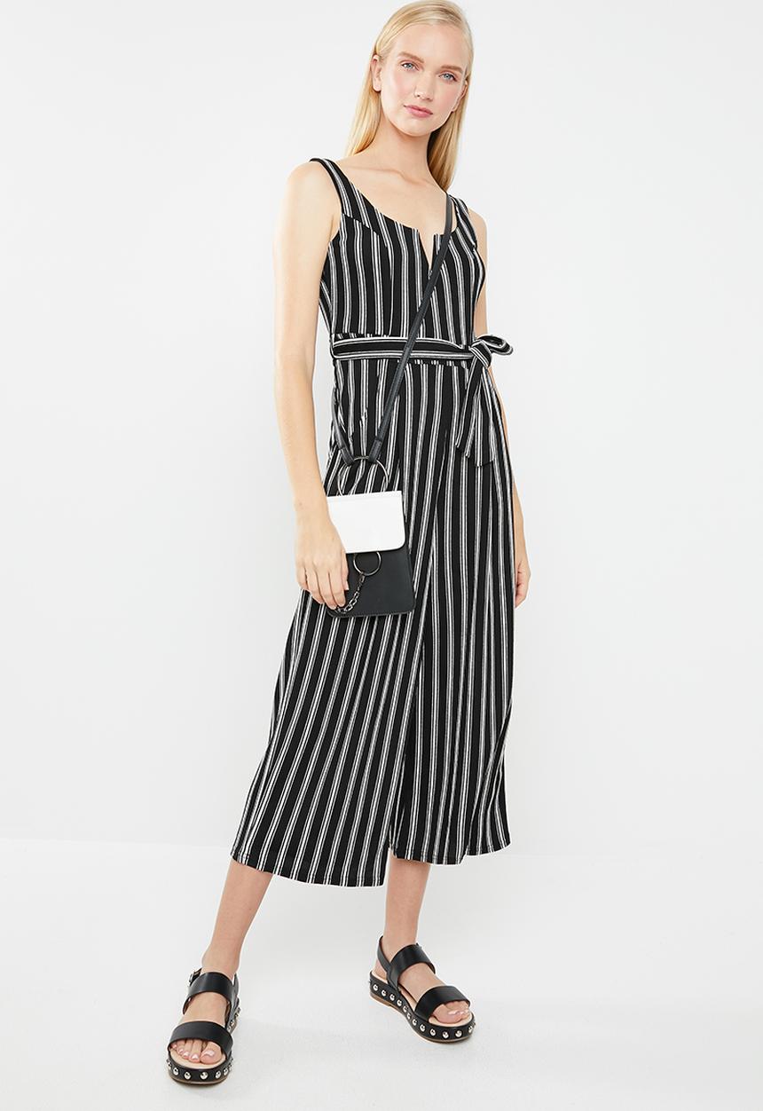 Revenge - V-front cut-out striped print jumpsuit - black & white 