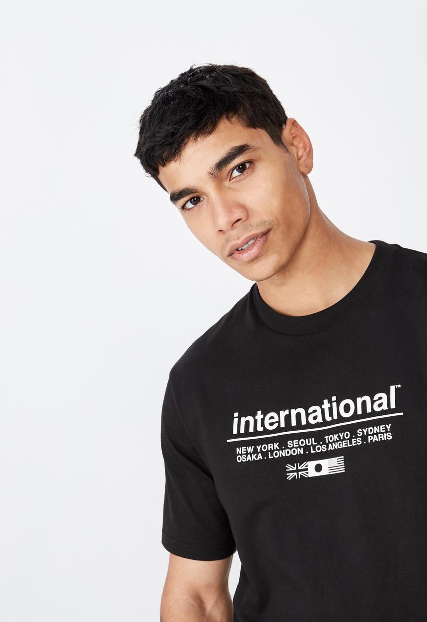 Cotton On - International 1983 tbar tee - black