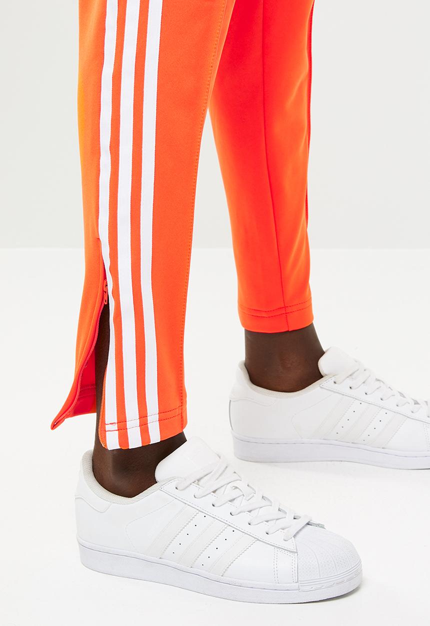 adidas Originals - SST trackpants - orange 