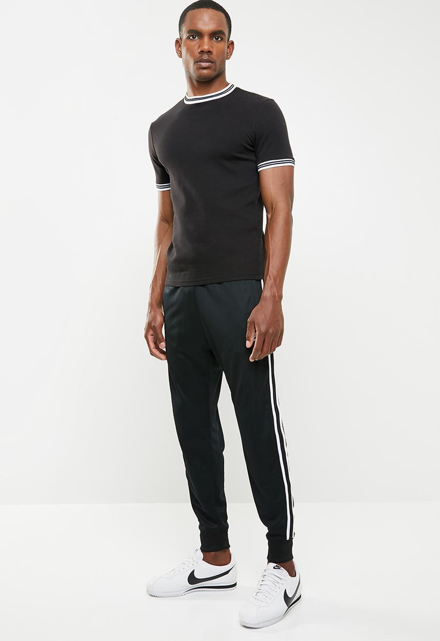 Nike - Nike sportswear jogger tribute - black & white