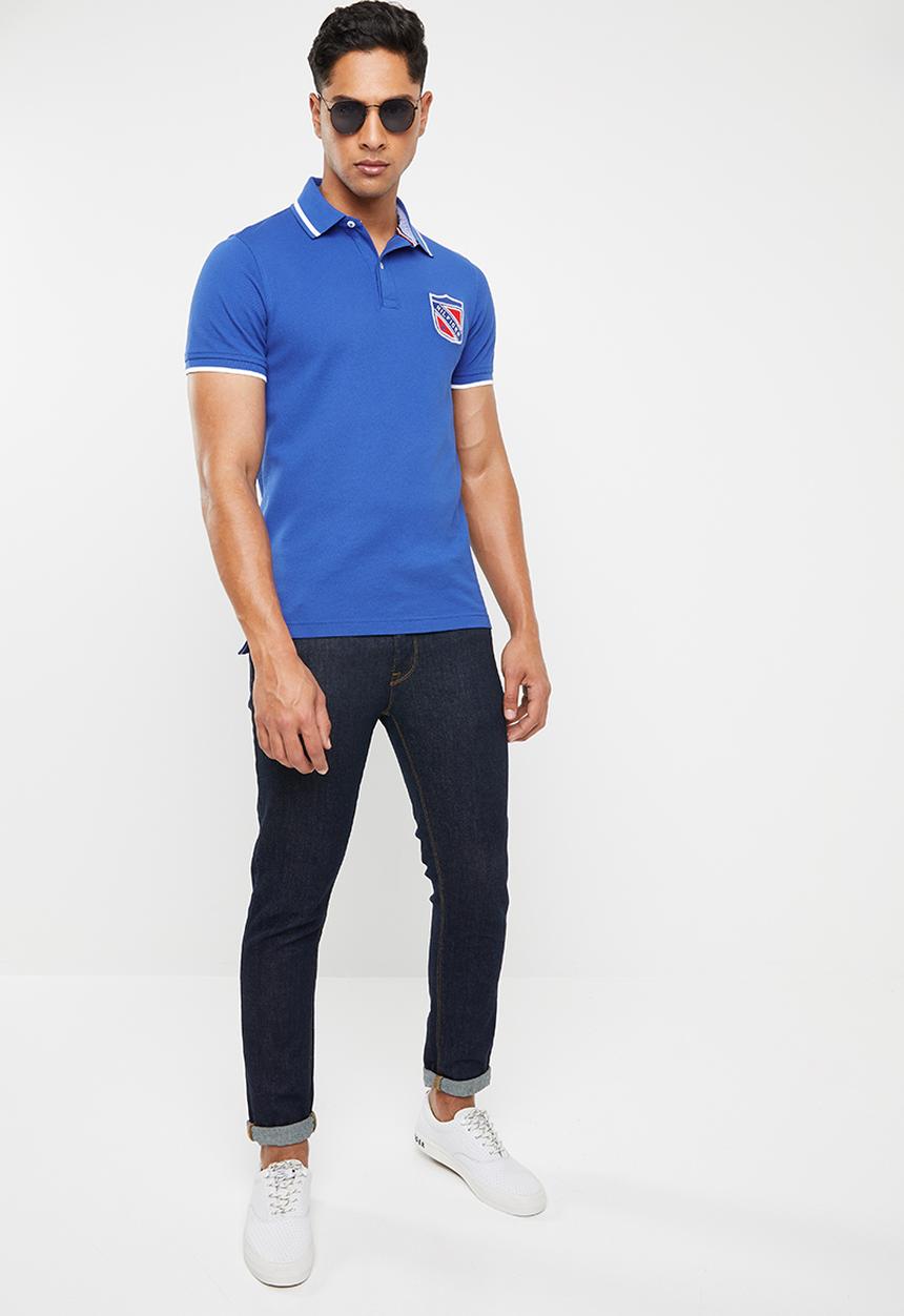 Tommy Hilfiger - Jarquard tipped badge slim polo - blue
