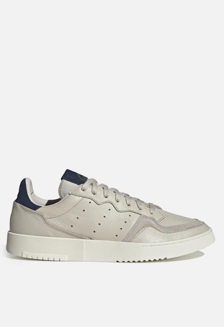 adidas Originals - Supercourt - clear brown / collegiate navy