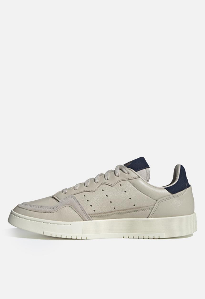 adidas Originals - Supercourt - clear brown / collegiate navy