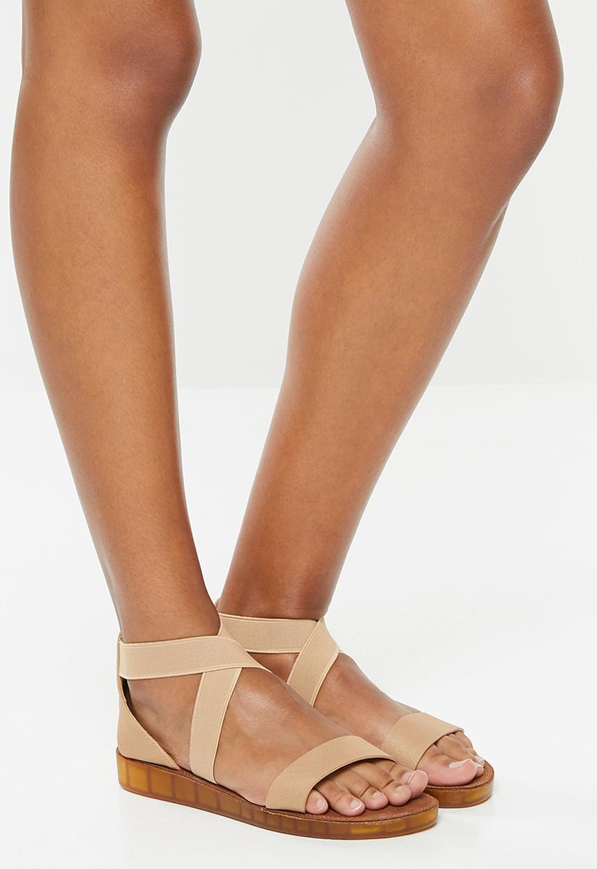 Butterfly Feet - Faux leather criss-cross flatform sandal - neutral