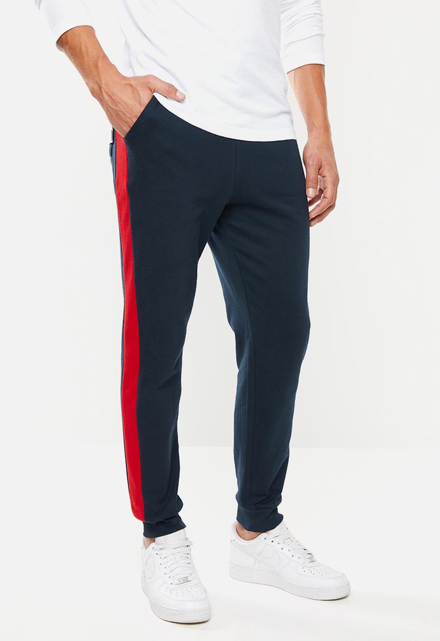 Superbalist - Skinny side stripe sweatpants - navy & red 