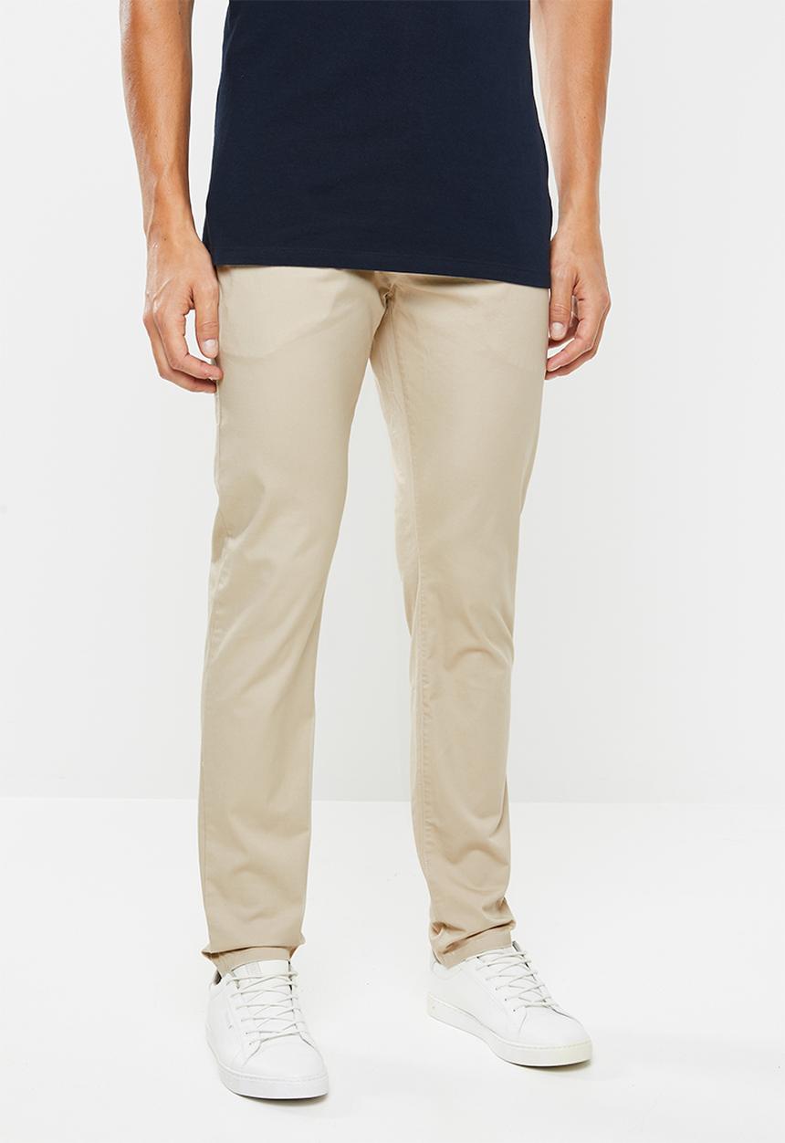 GUESS - Fashion chino pants - beige 