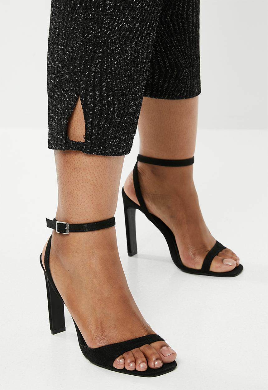 AMANDA LAIRD CHERRY - Crossover jumpsuit with flared sleeves - black