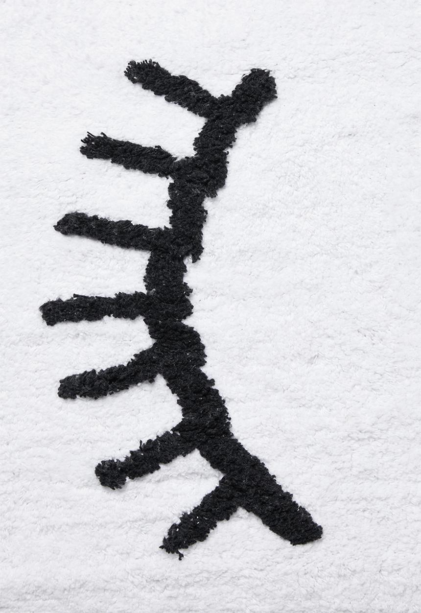 Sixth Floor - Winking tufted bath mat - white & black