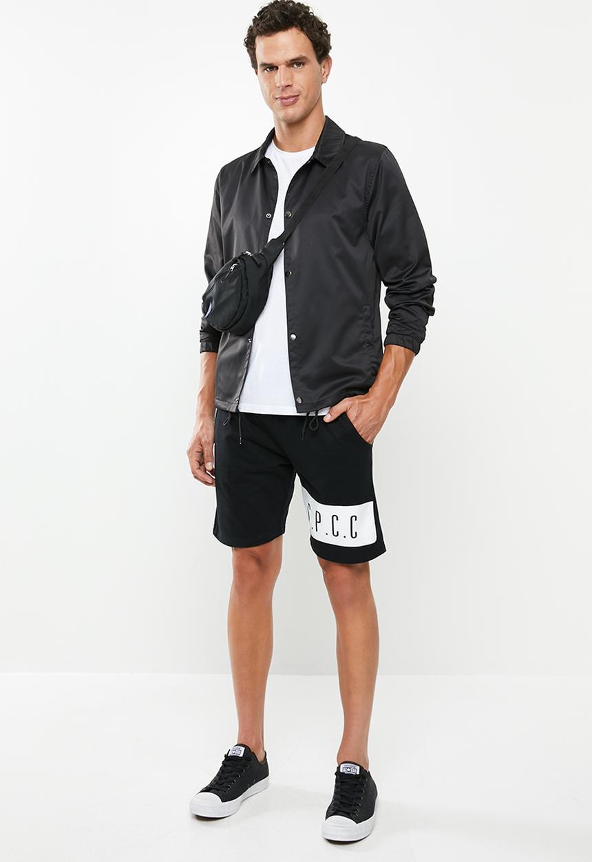 S.P.C.C - Printed knit shorts - black