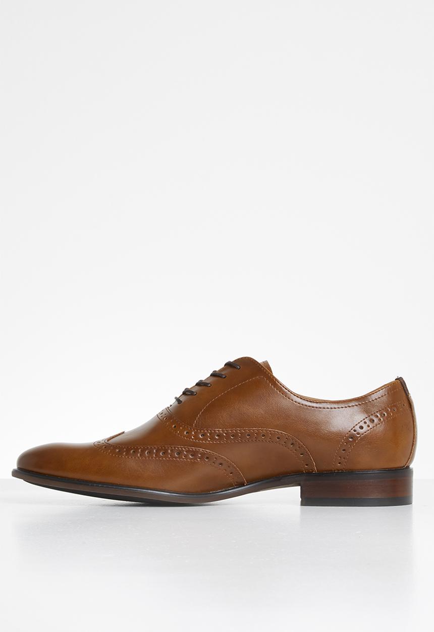 Call It Spring - Hallervorde - cognac
