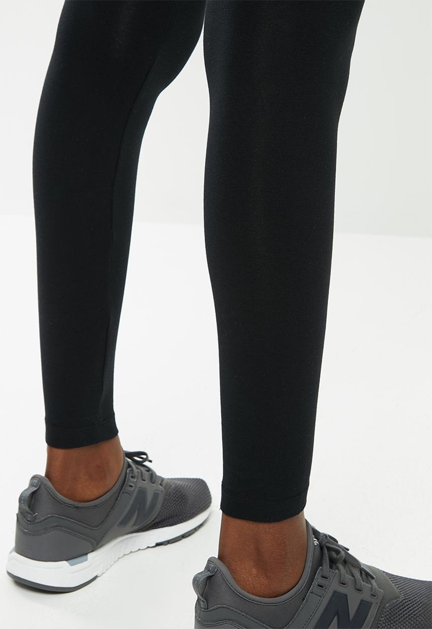 New Balance  - Essential stacked logo legging - black