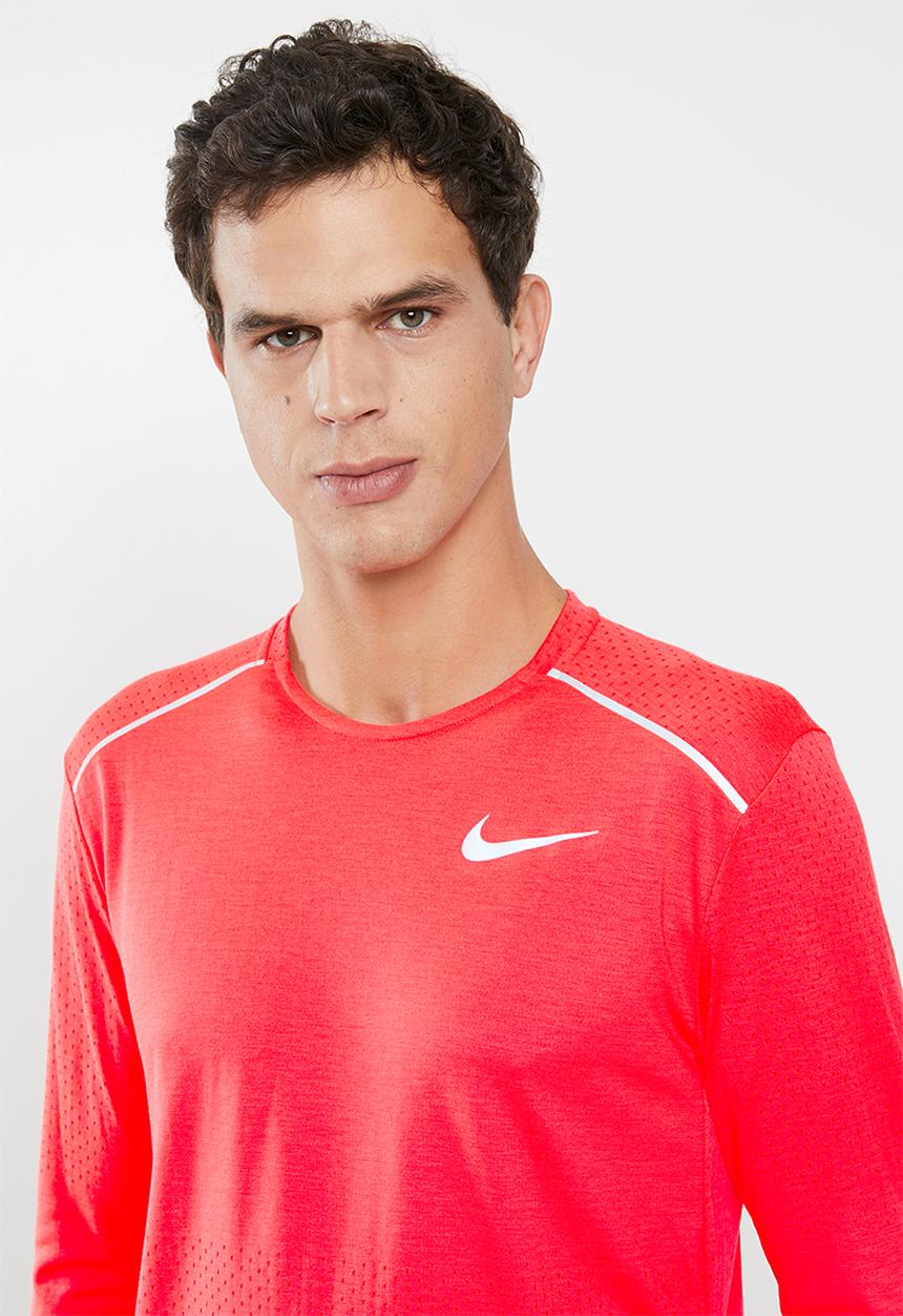 Nike - Nike rise 365 long sleeve tee - orange