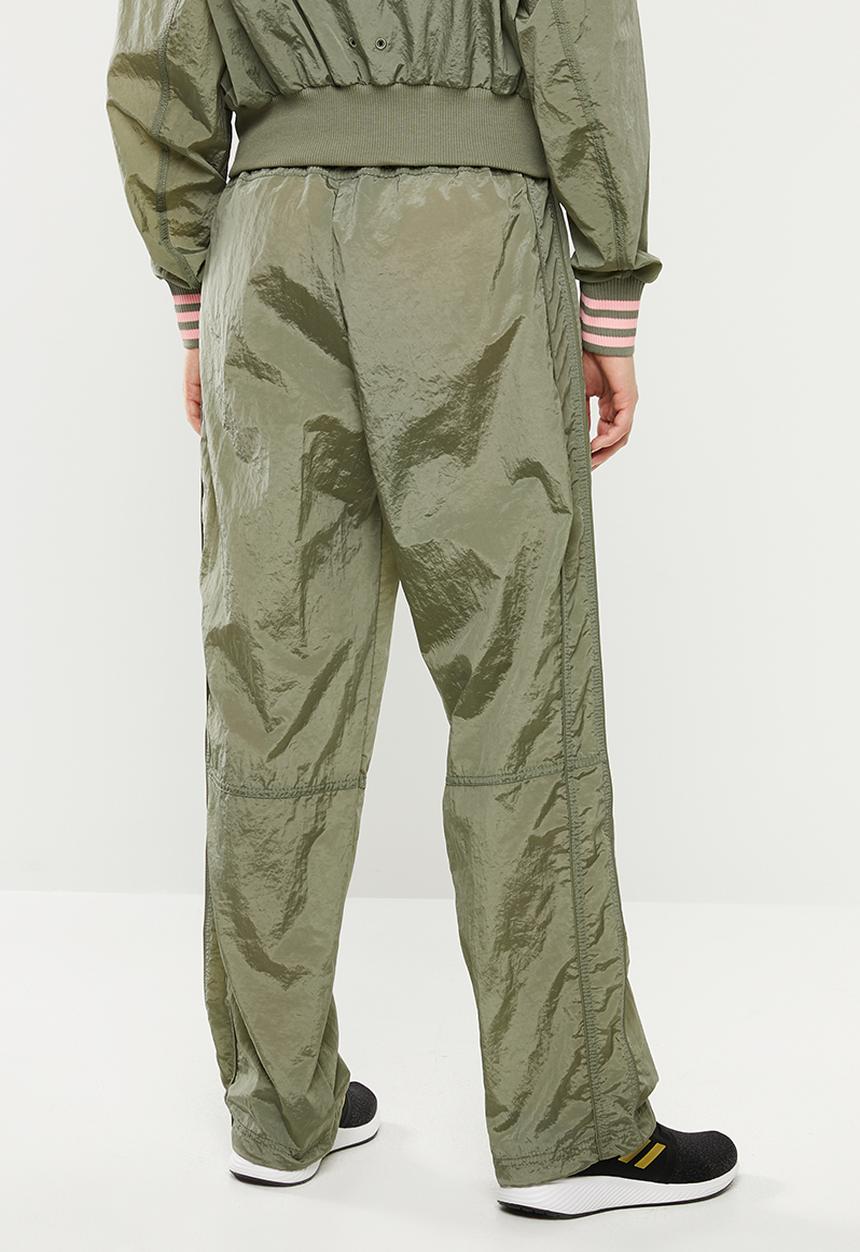 adidas Performance - Woven pants - green