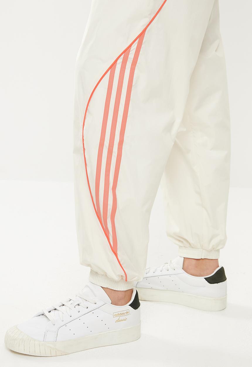 adidas Originals - Fakten track pants - white & orange