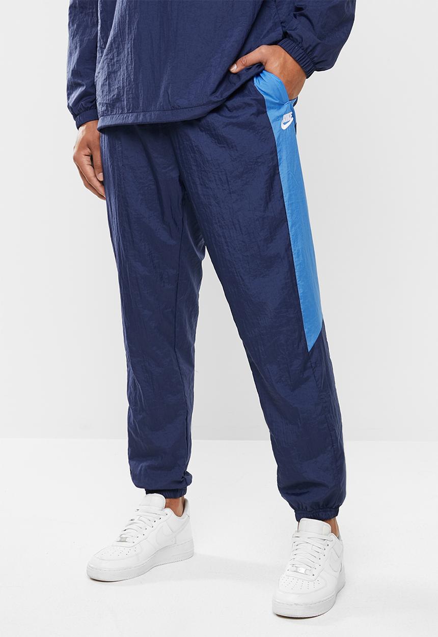 Nike - Nsw woven cf pants - midnight navy/pacific blue/white