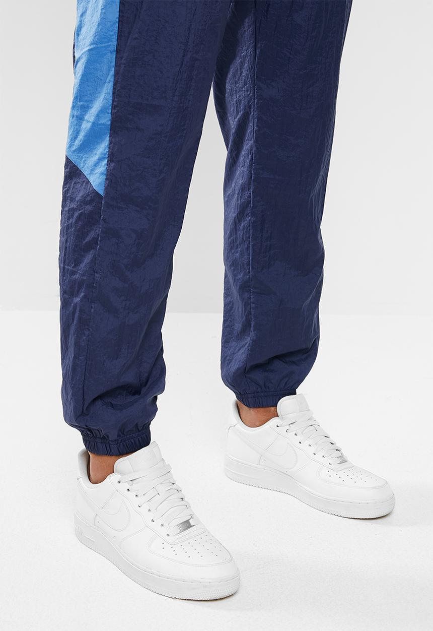 Nike - Nsw woven cf pants - midnight navy/pacific blue/white