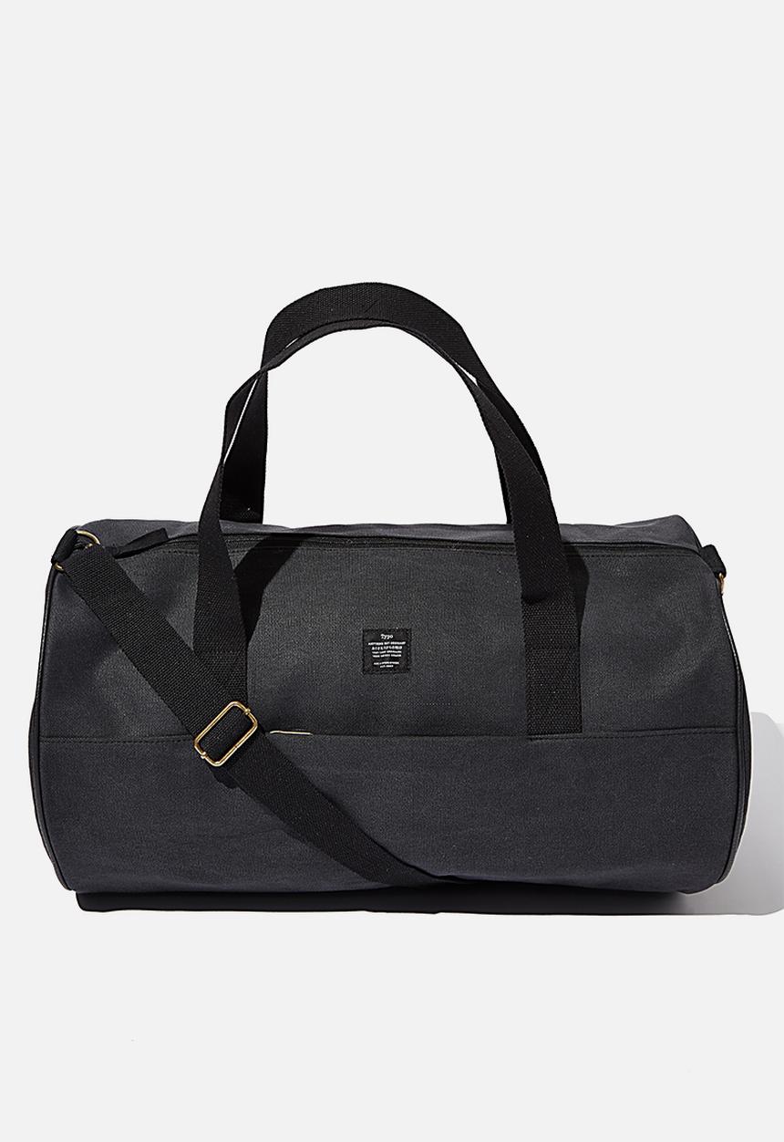 Typo - Canvas barrel bag - black