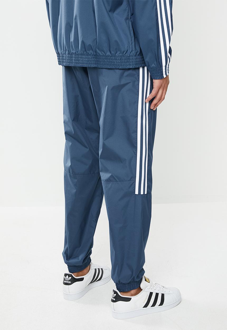 adidas Originals - Lock up track pants - blue & white