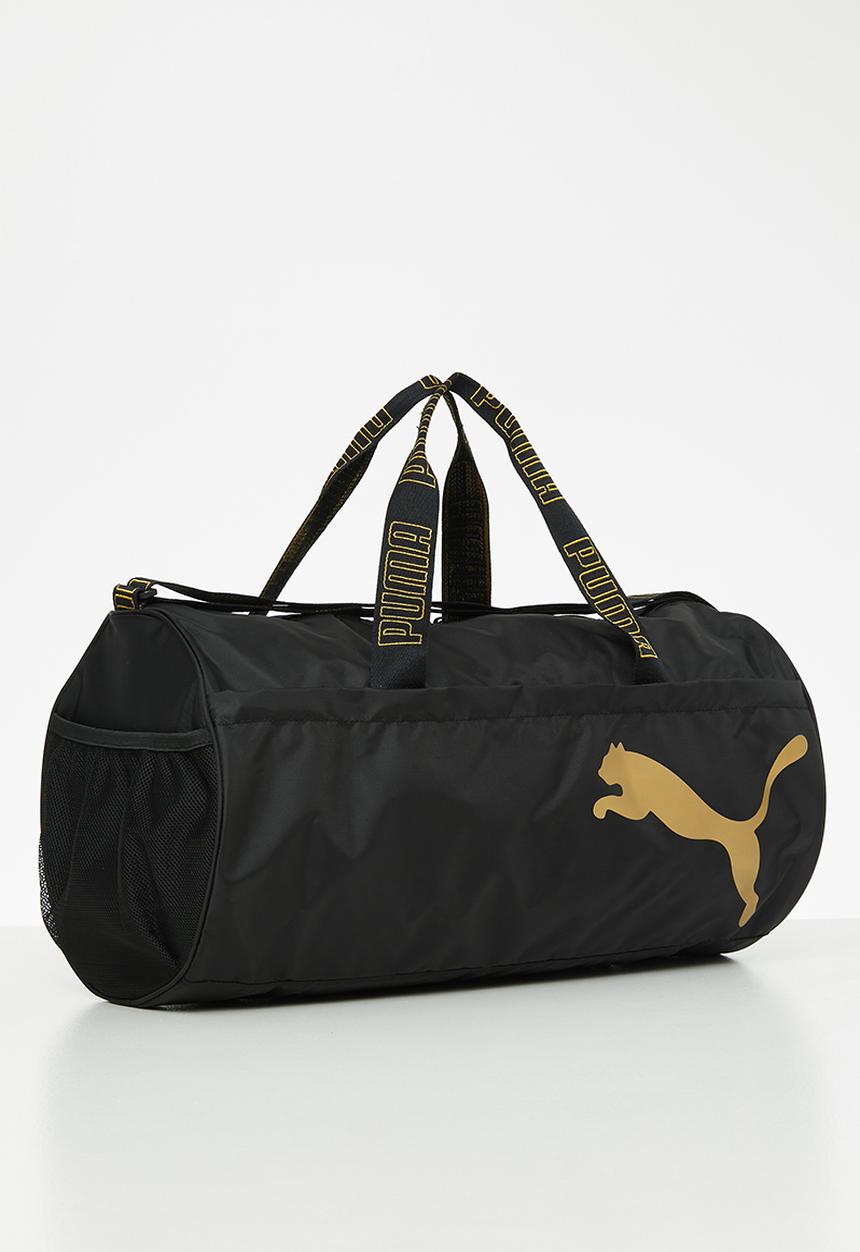 PUMA - AT ESS barrel bag - puma black & metallic gold