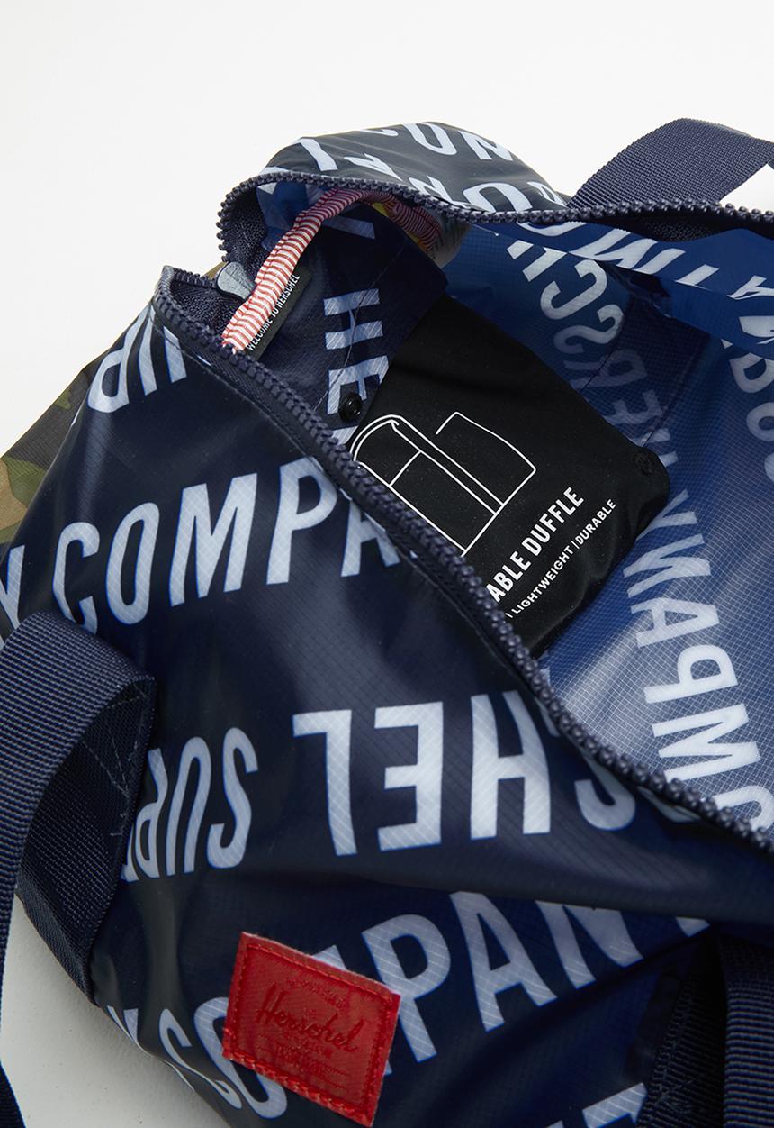 Herschel Supply Co. - Packable roll call duffle - peacoat woodland camo