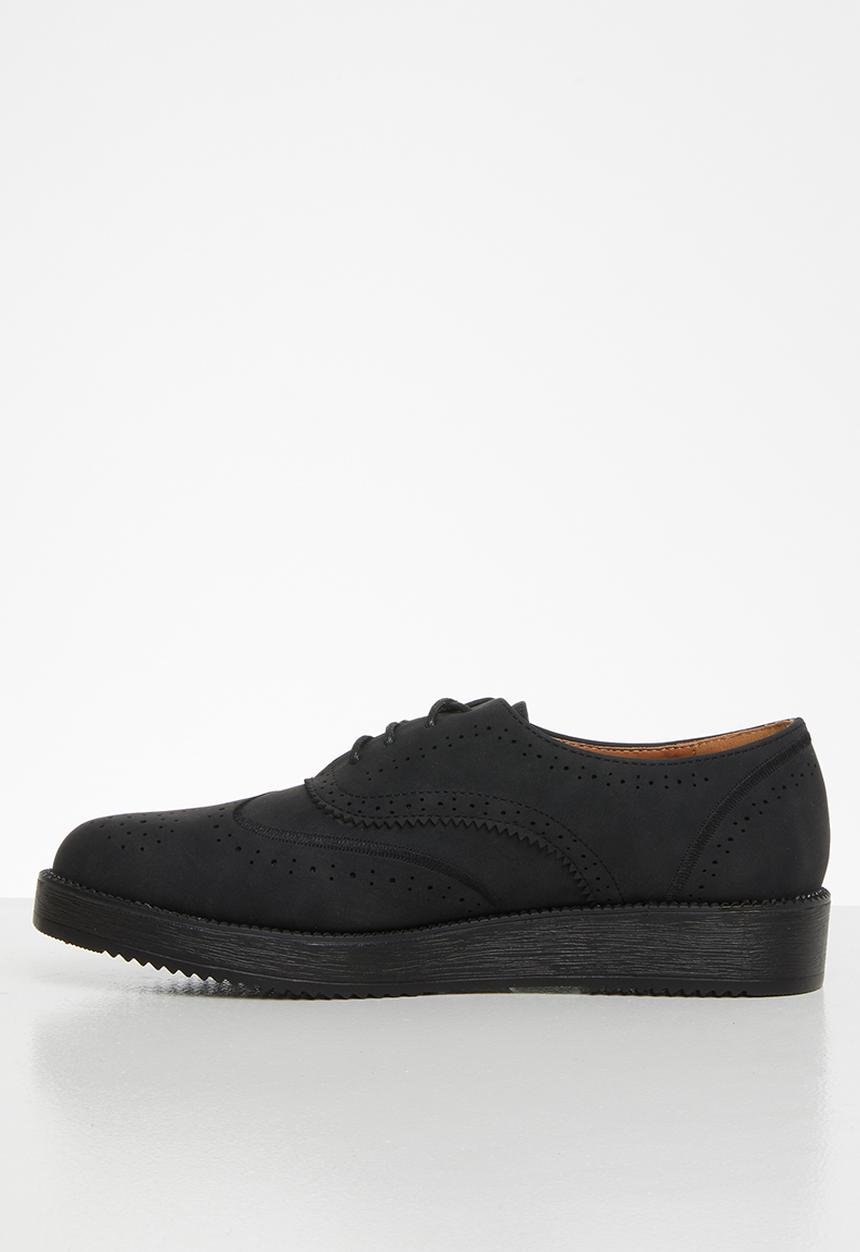 Jada - Flatform brogue - black