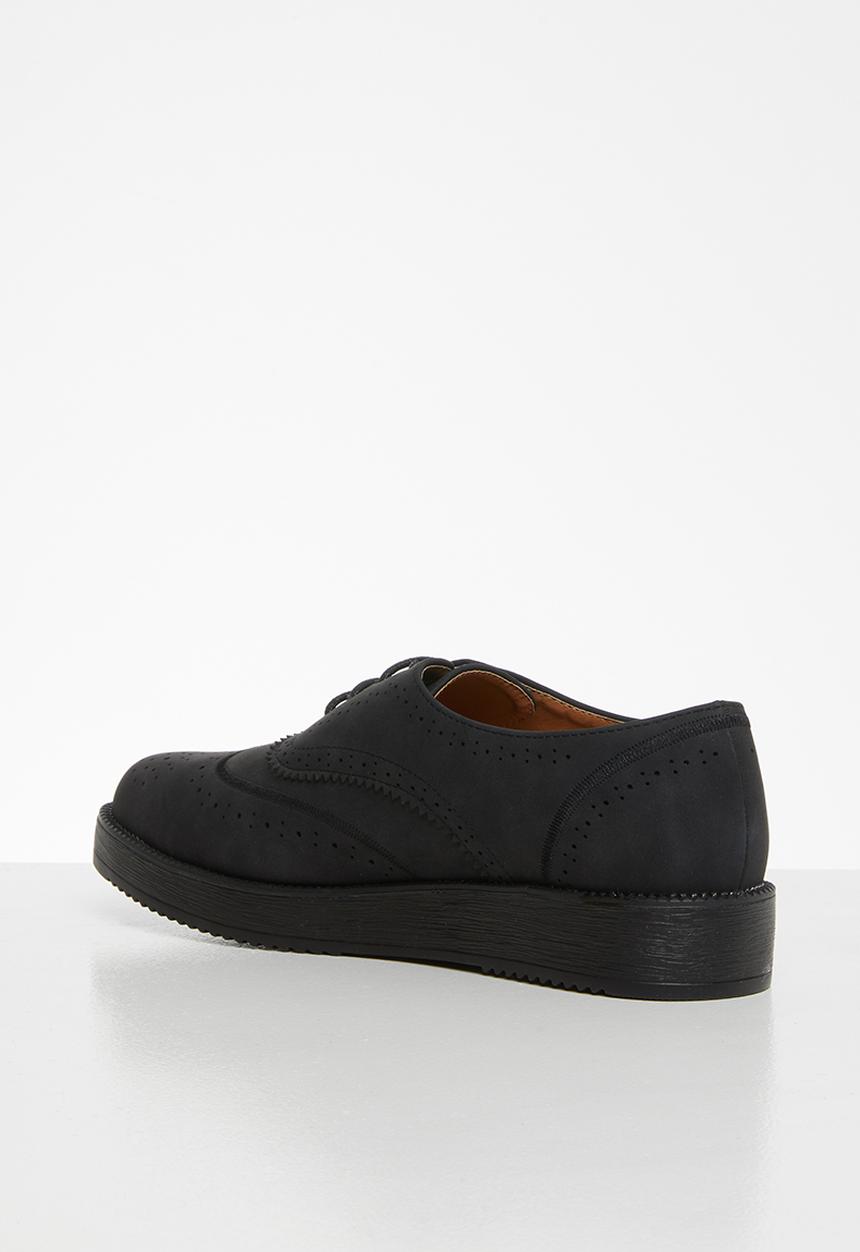 Jada - Flatform brogue - black