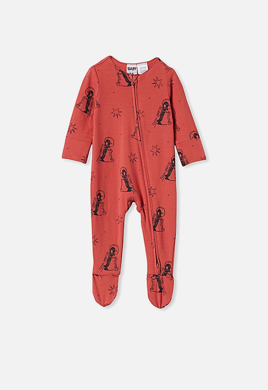 Cotton On - The long sleeve zip romper - red brick/penguin astronaut