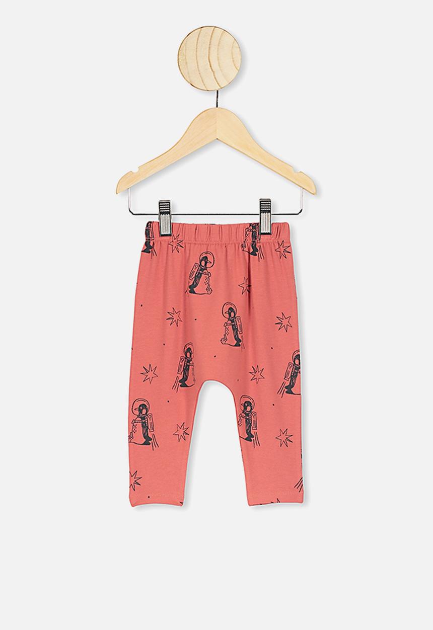 Cotton On - The legging - red brick/penguin astronaut