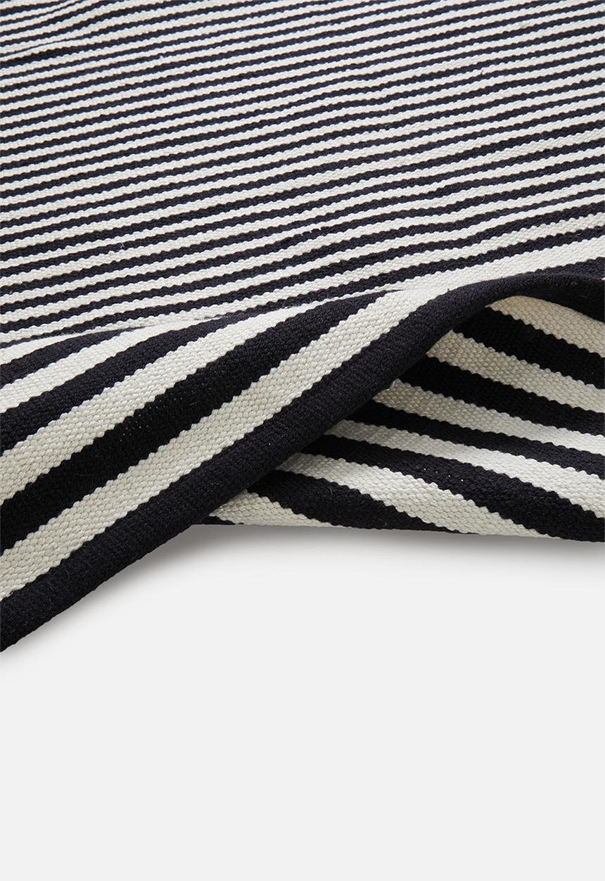 Sixth Floor - Goa woven outdoor rug - natural & black