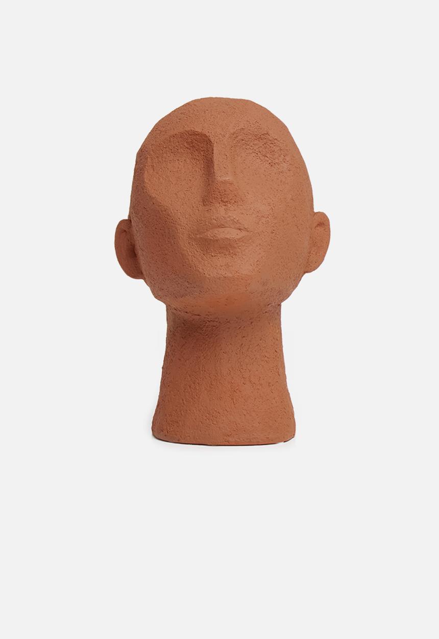 Present Time - Statue face art up - terracotta orange