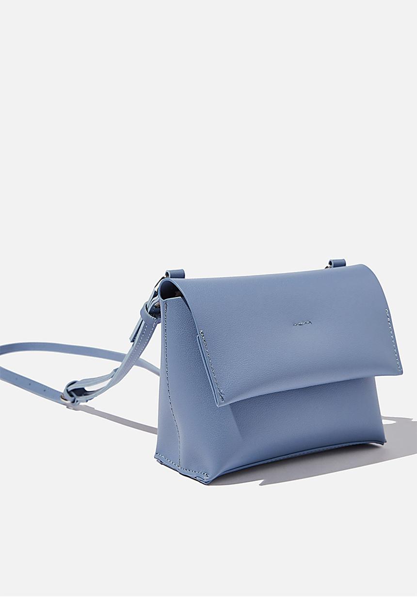 Rubi - Whit cross body bag - vintage blue