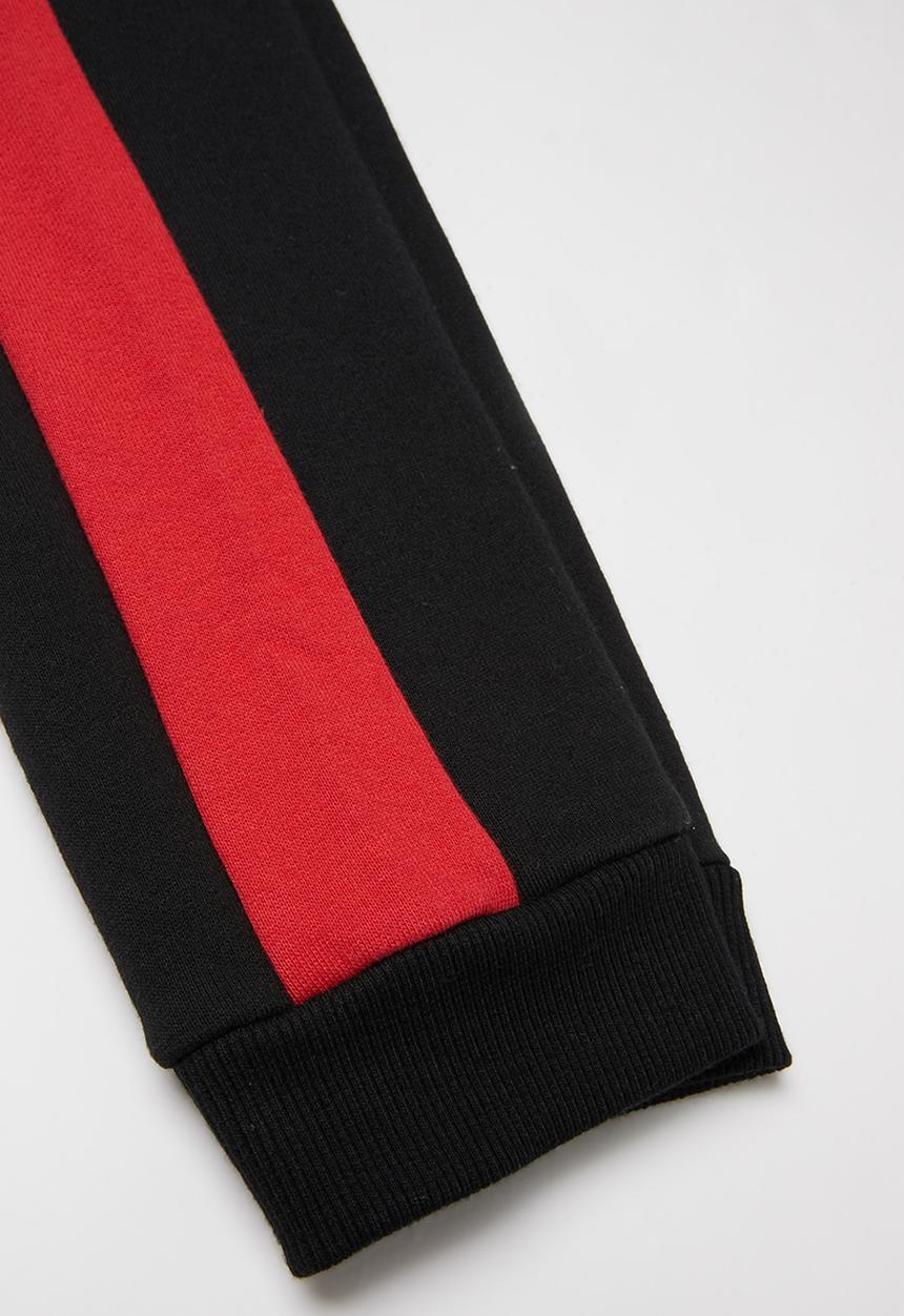 GUESS - Guess fashion active pants - black & red 