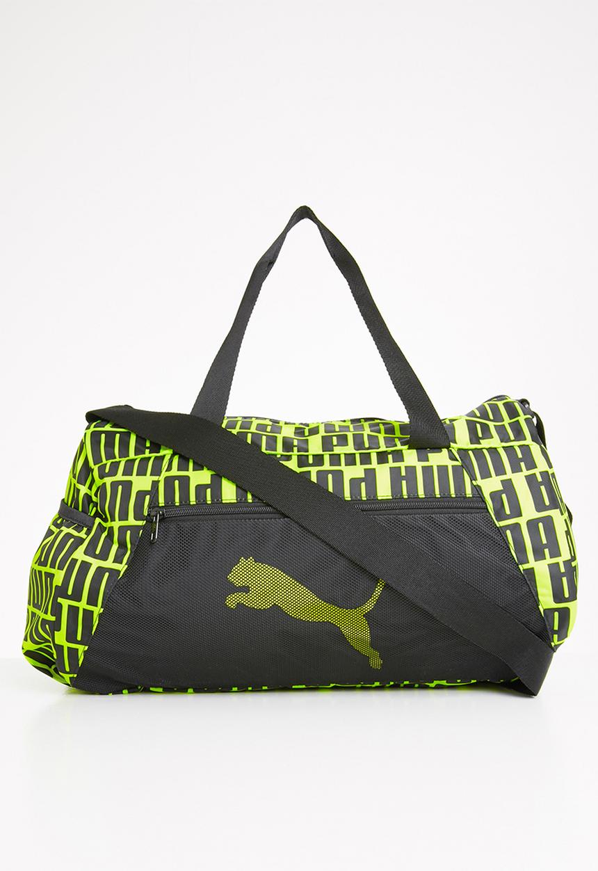 PUMA - At essential barrel bag - yellow & black 