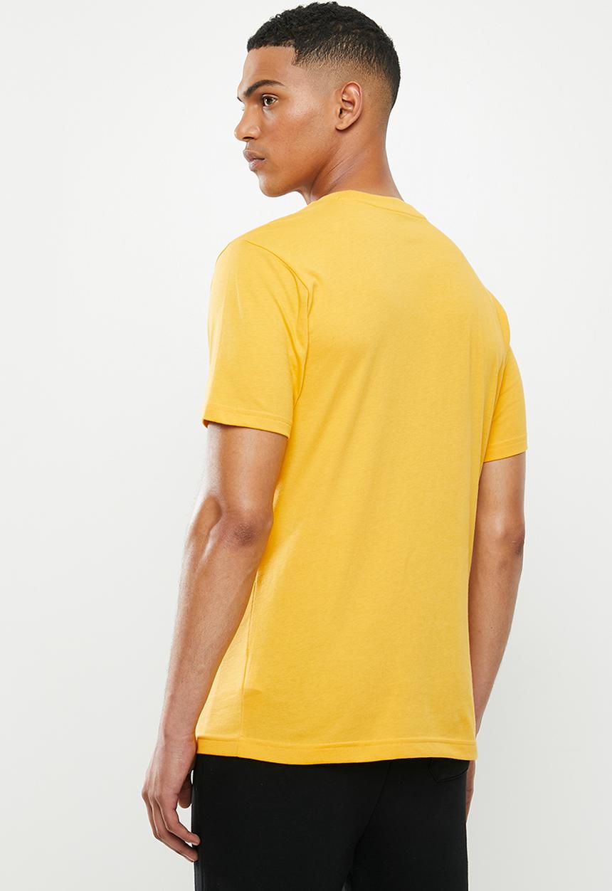 New Balance  - Nb classic core logo tee - yellow