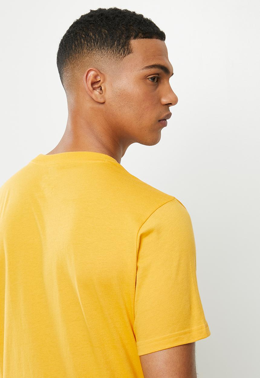 New Balance  - Nb classic core logo tee - yellow