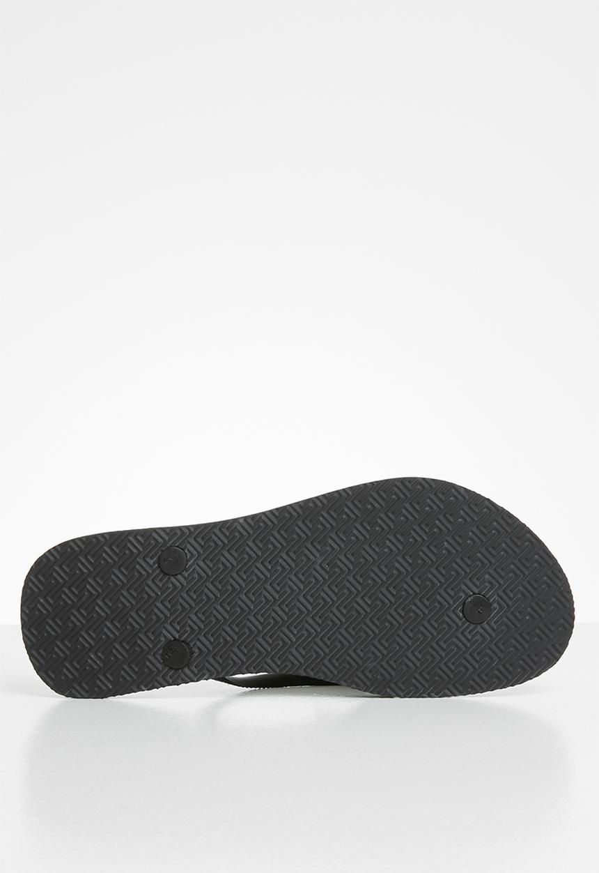 Samba Sol - Tropical flip flop - black