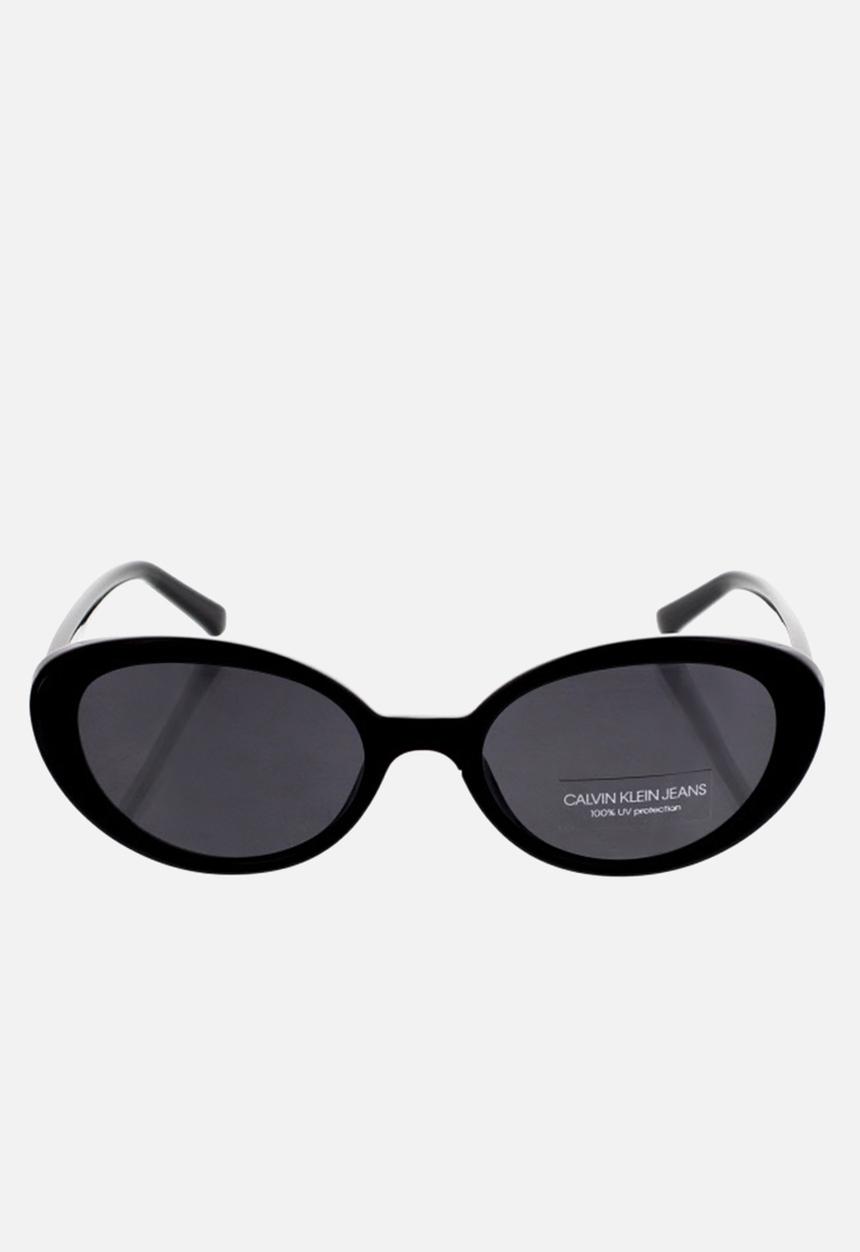 CALVIN KLEIN JEANS - DNU - Calvin klein jeans oval sunglasses - black