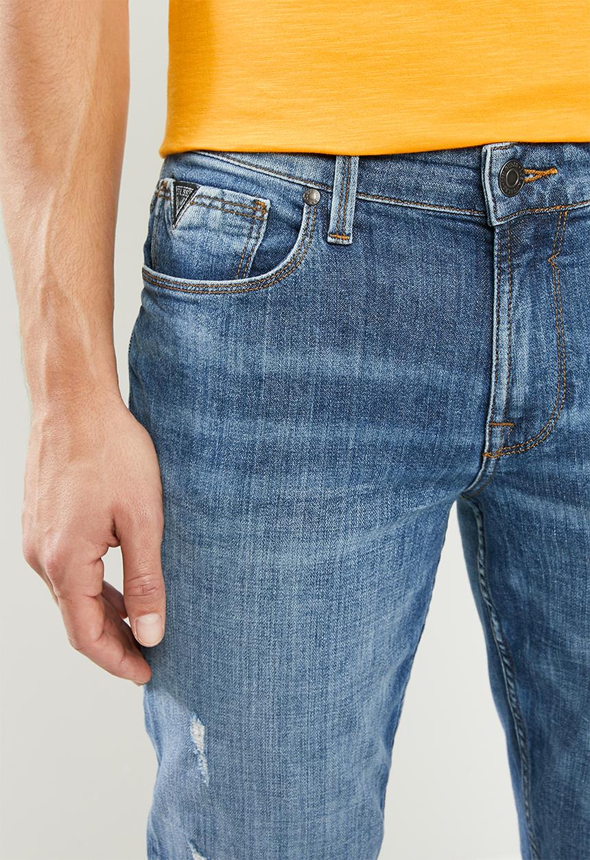 GUESS - Mid wash slim taper with rips - mid blue