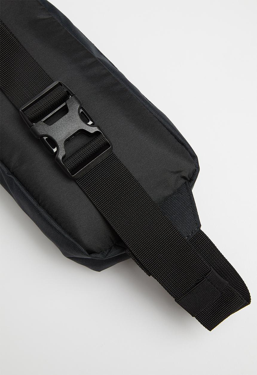 PUMA - Originals waist bag - black & gold