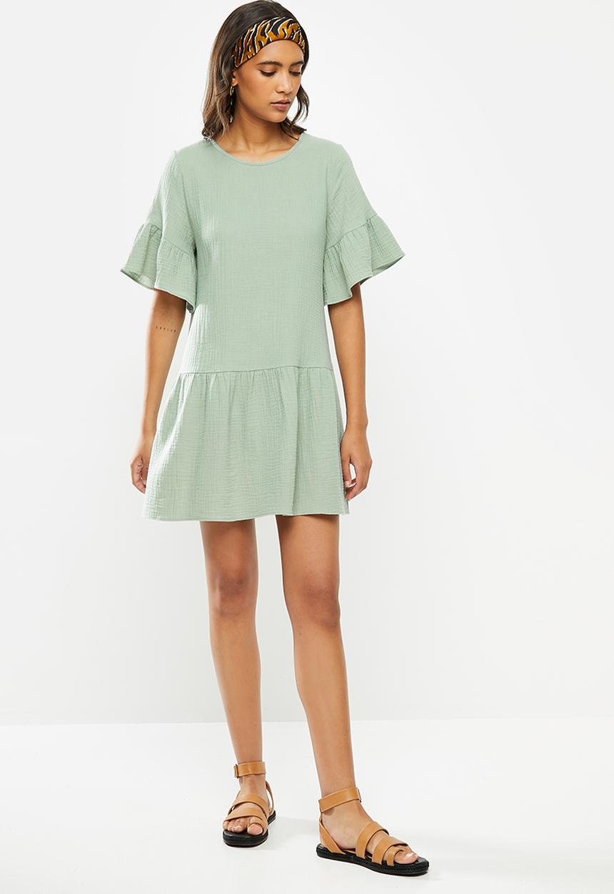 Blake - Dropped waist mini dress with ruffle sleeve - antique sage