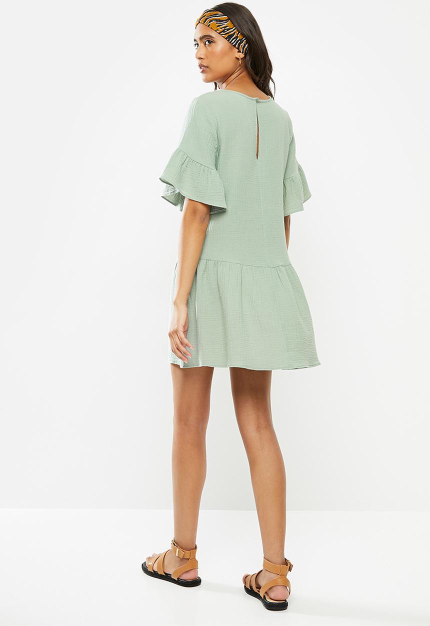 Blake - Dropped waist mini dress with ruffle sleeve - antique sage