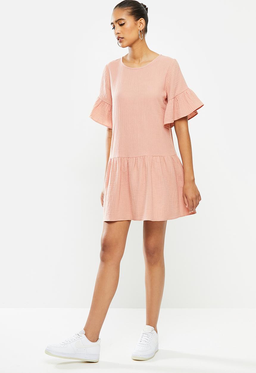 Blake - Dropped waist mini dress with ruffle sleeve - pale rose