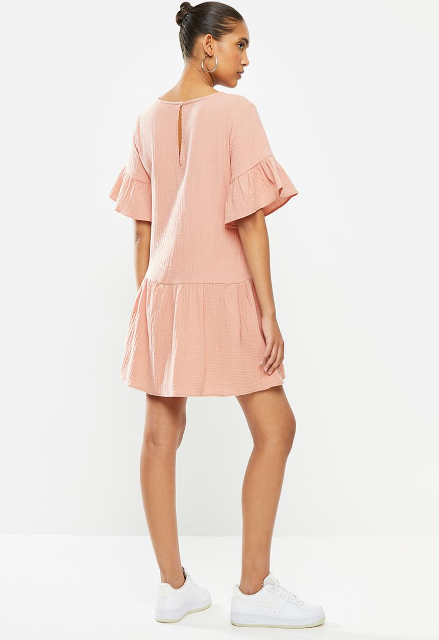 Blake - Dropped waist mini dress with ruffle sleeve - pale rose