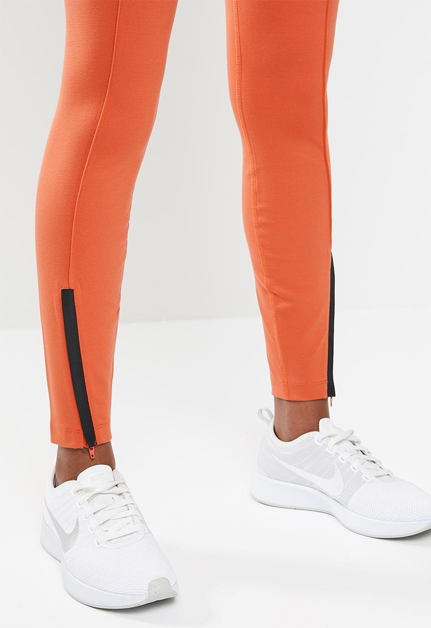 Nike - Nws legasee zip legging - orange