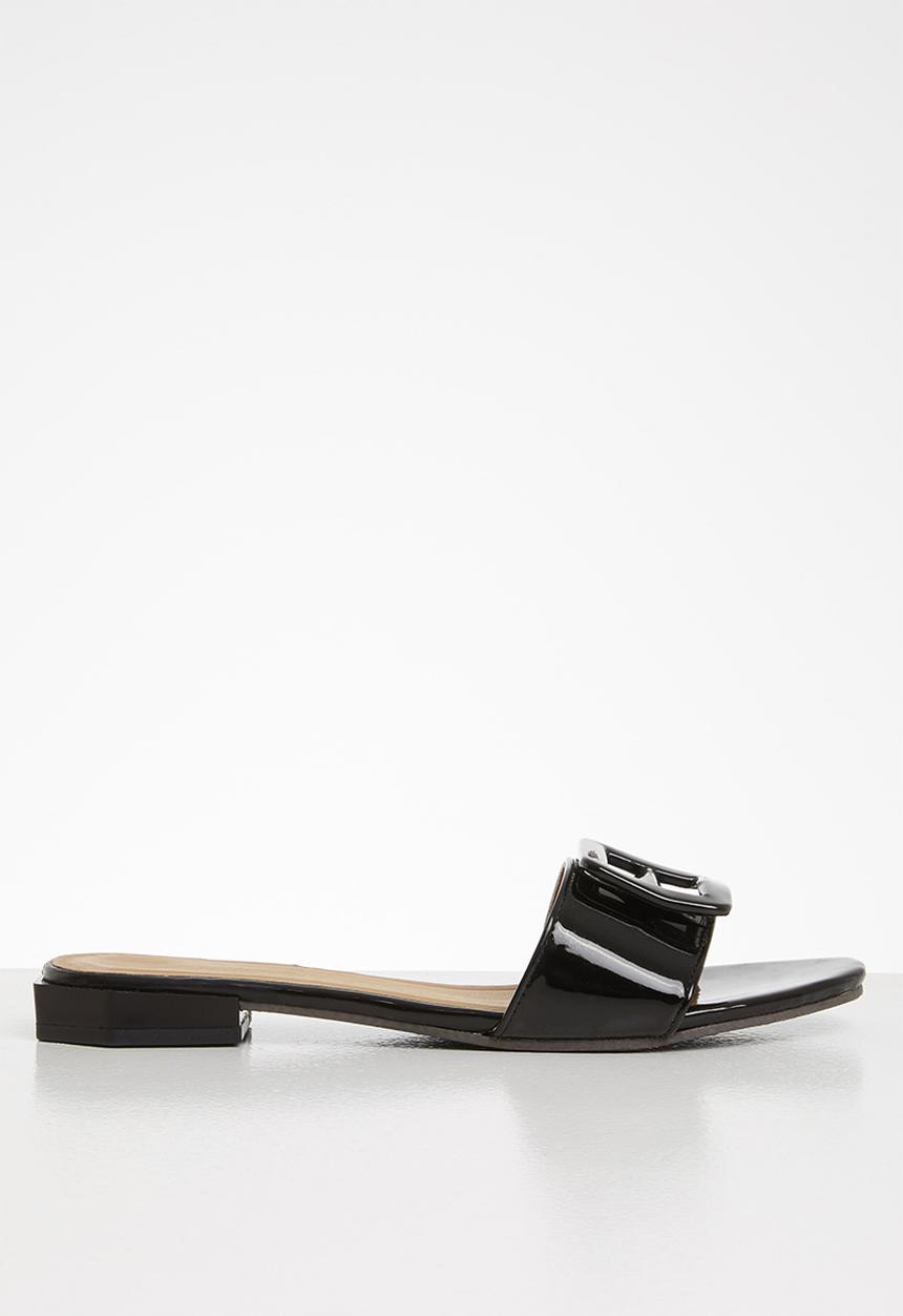 Seduction - Big buckle low heel slide - black