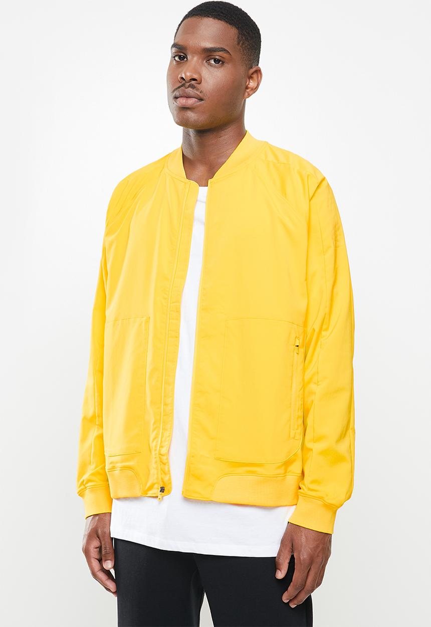 Under Armour - Undrtd woven warmup jacket - yellow 