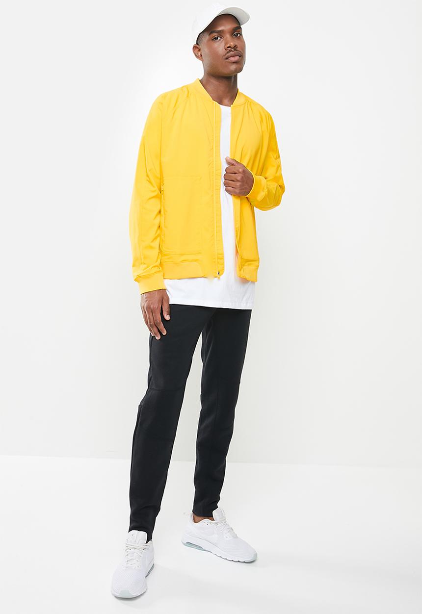 Under Armour - Undrtd woven warmup jacket - yellow 