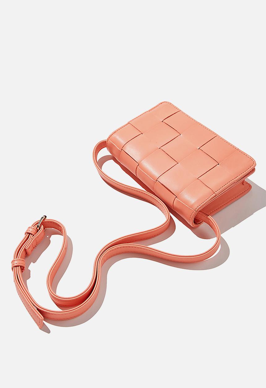 Rubi - Christy woven cross body bag - coral pink